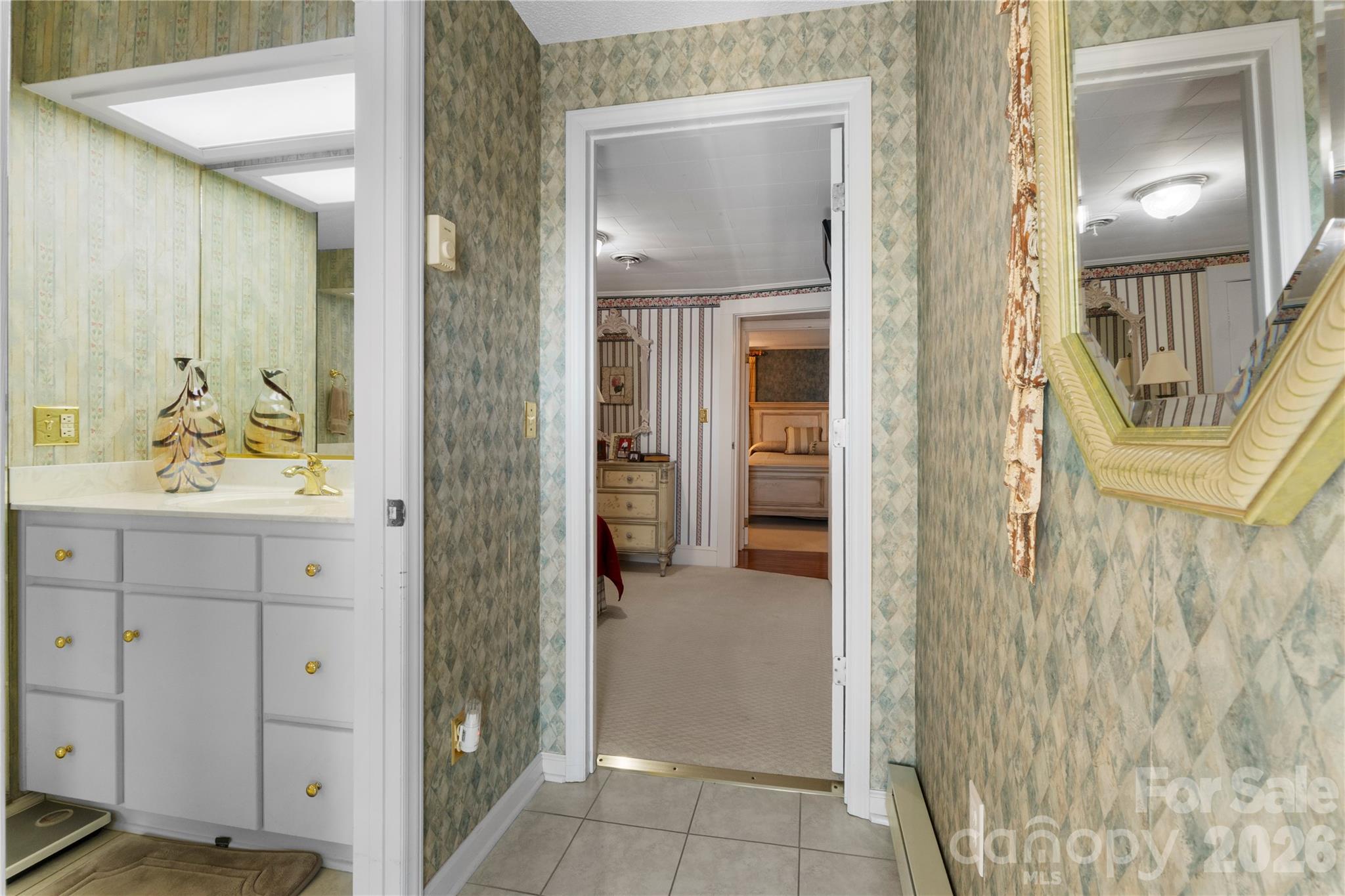 1687 Sexton Road, Unit 5 Denton, NC 27239 - Photo 25 of 48 view of bathroom with a sink mirror and tub