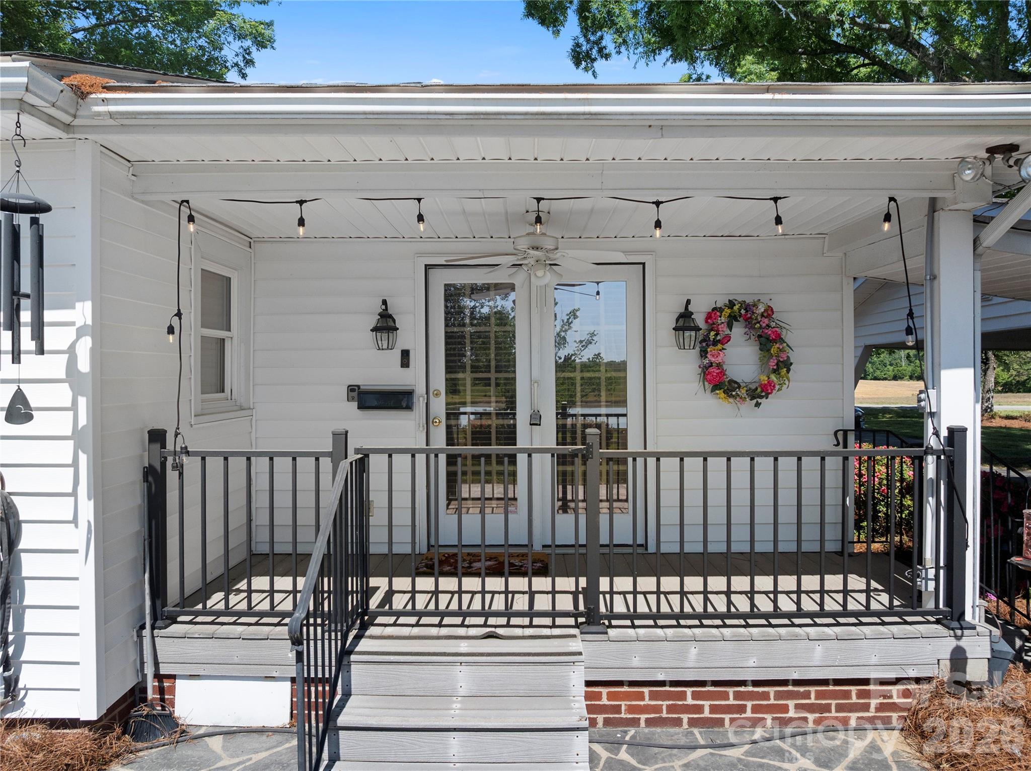 1687 Sexton Road, Unit 5 Denton, NC 27239 - Photo 42 of 48 a view of a porch with wooden floor