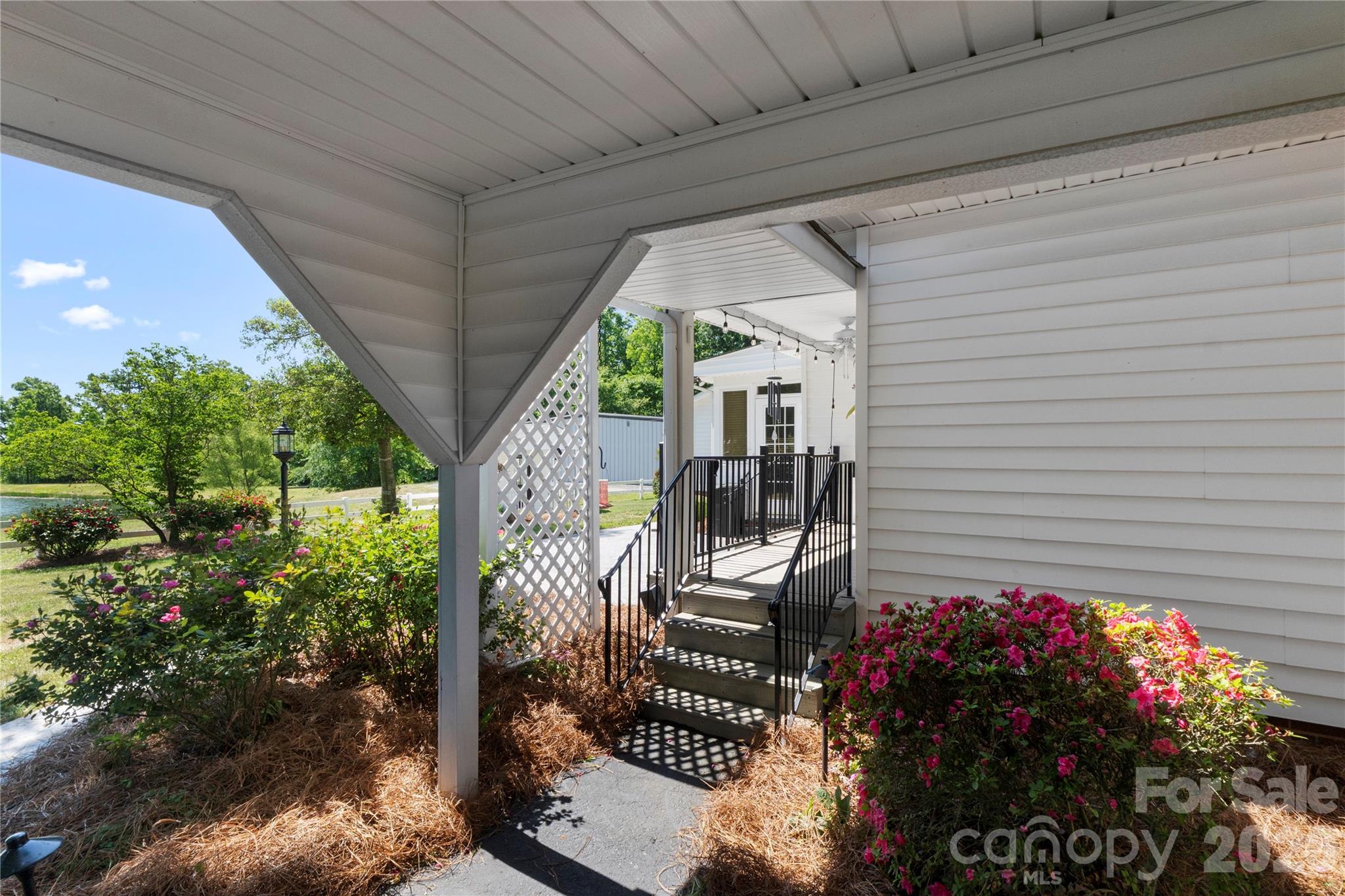 1687 Sexton Road, Unit 5 Denton, NC 27239 - Photo 5 of 48 a view of a porch with furniture