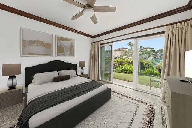 a view of a livingroom with a ceiling fan and window