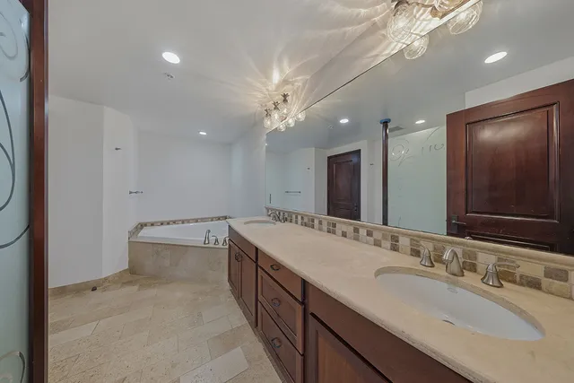 a view of an empty room with a fireplace