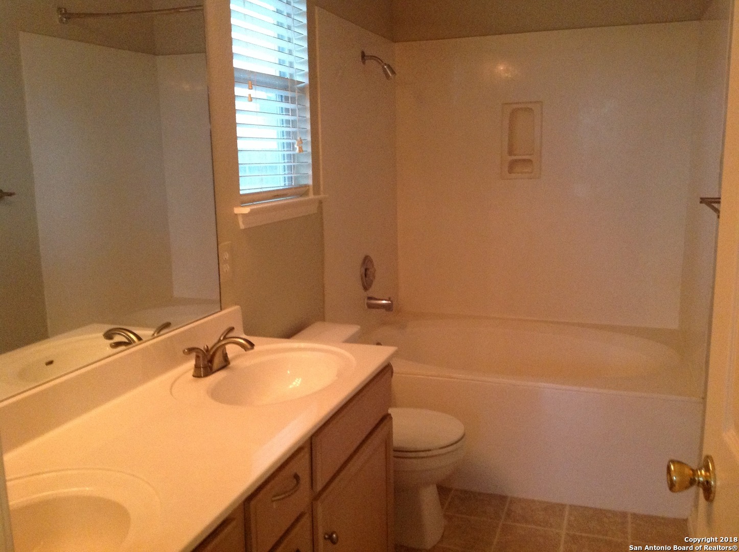 9030 Pinseeker Selma, TX 78154 - Photo 12 of 16 a bathroom with a sink and a toilet