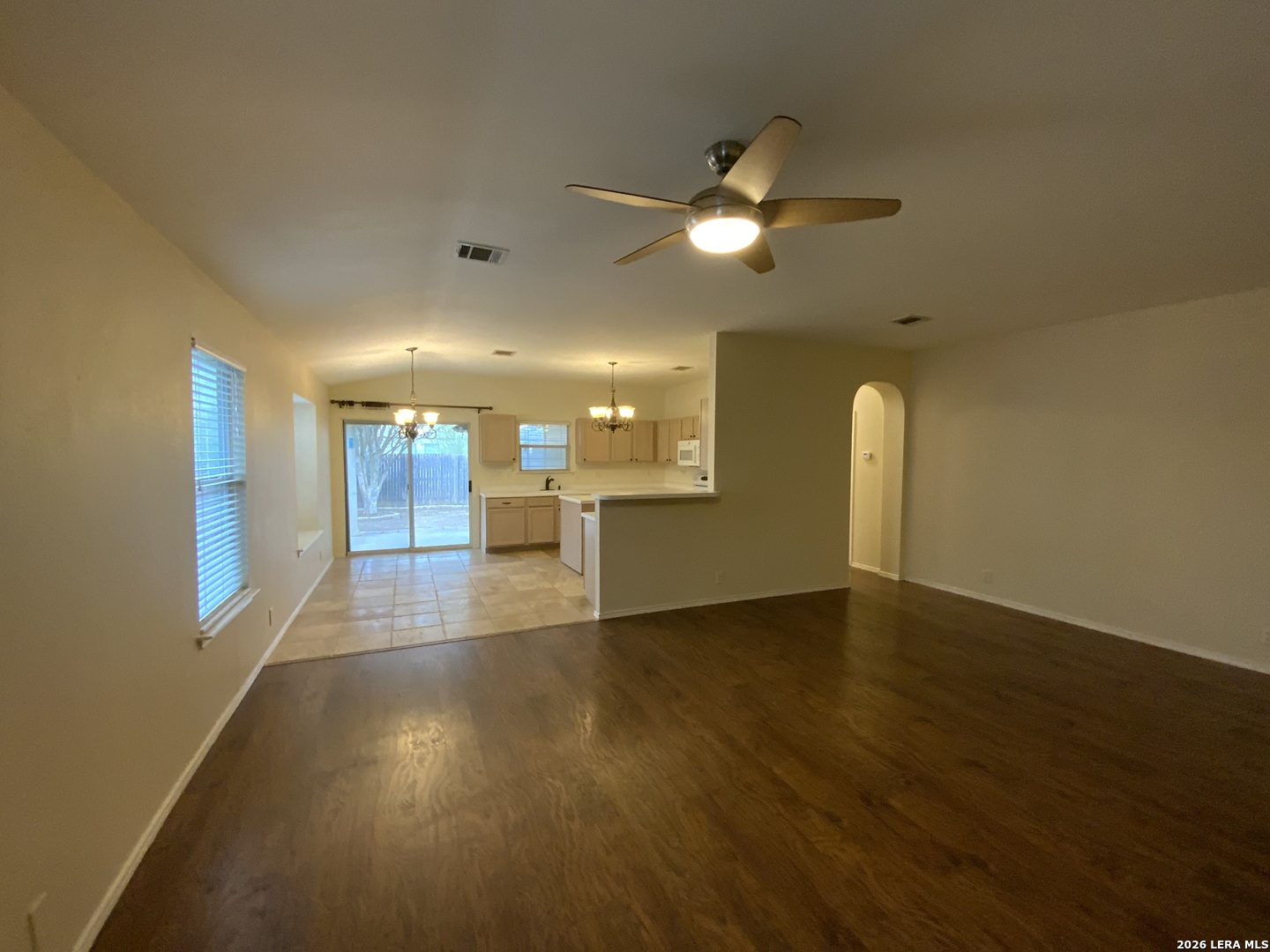 9030 Pinseeker Selma, TX 78154 - Photo 4 of 16 a view of a kitchen with a sink and a window