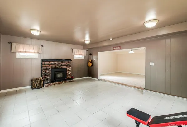 a bed room with a bed and a lamp