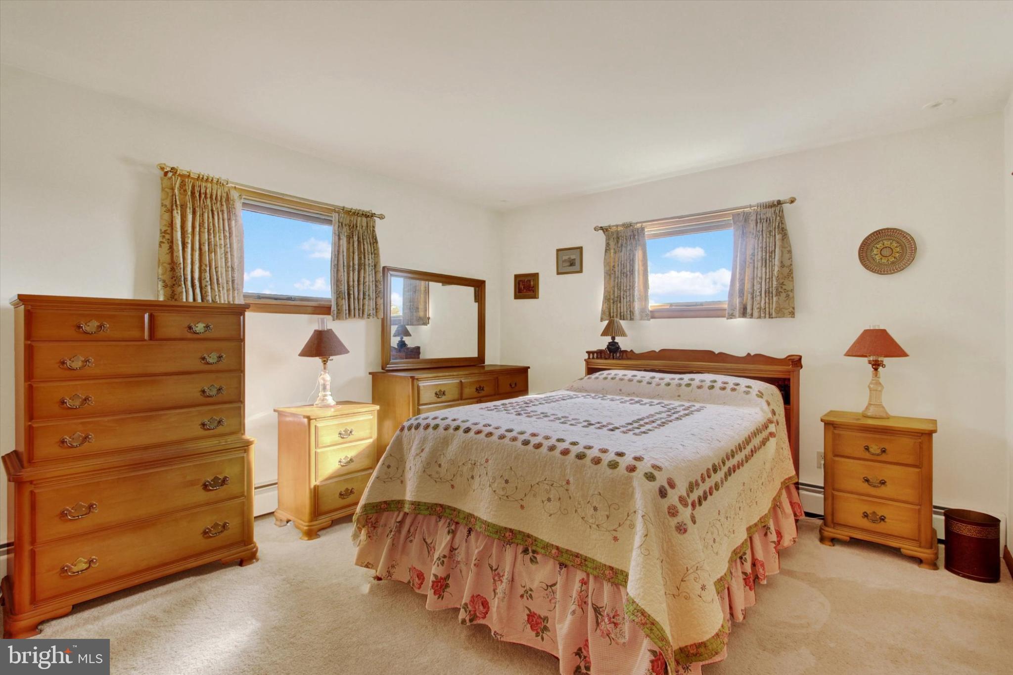 930 Hoffman Road Gettysburg, PA 17325 - Photo 11 of 36 a bedroom with a bed and a dresser
