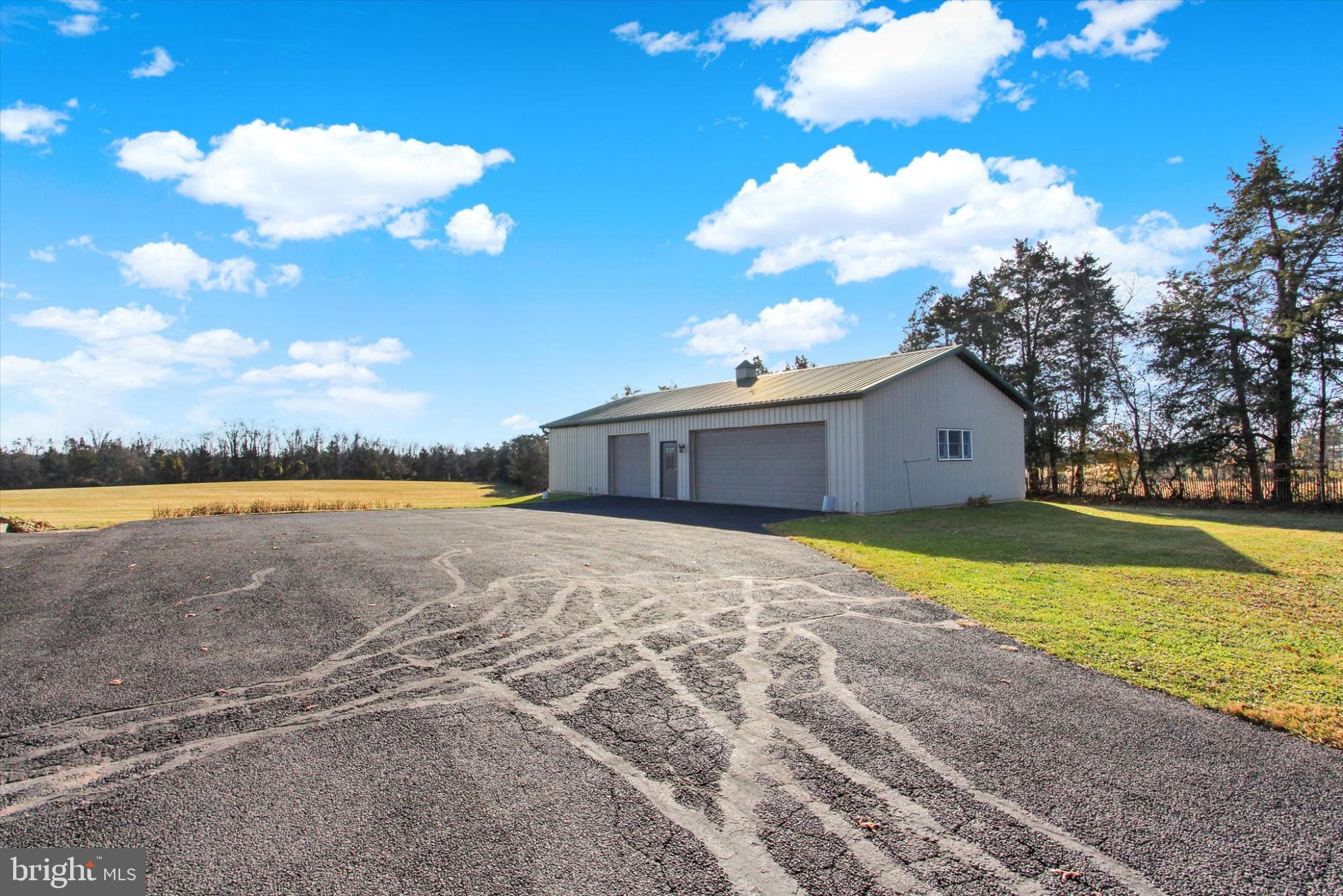 930 Hoffman Road Gettysburg, PA 17325 - Photo 30 of 36 a view of a house with a yard