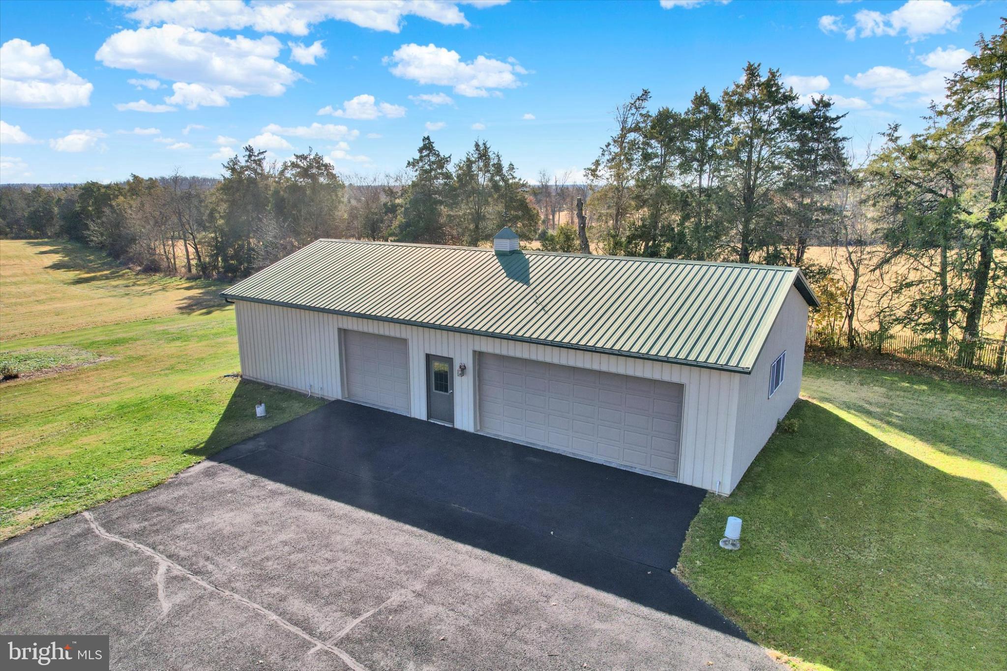 930 Hoffman Road Gettysburg, PA 17325 - Photo 3 of 36 a view of a house with a yard