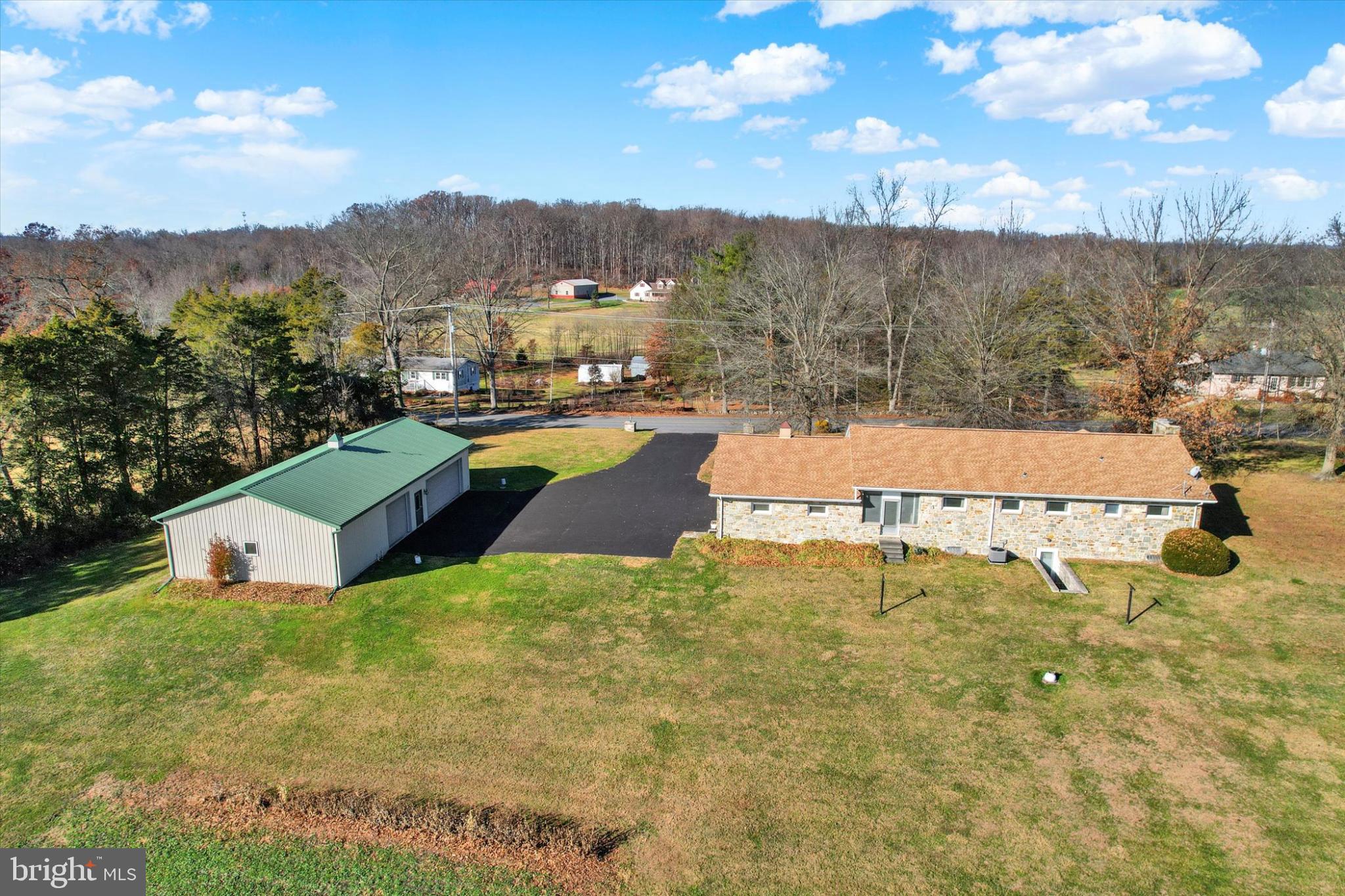 930 Hoffman Road Gettysburg, PA 17325 - Photo 31 of 36 a view of a swimming pool with a yard and mountain view