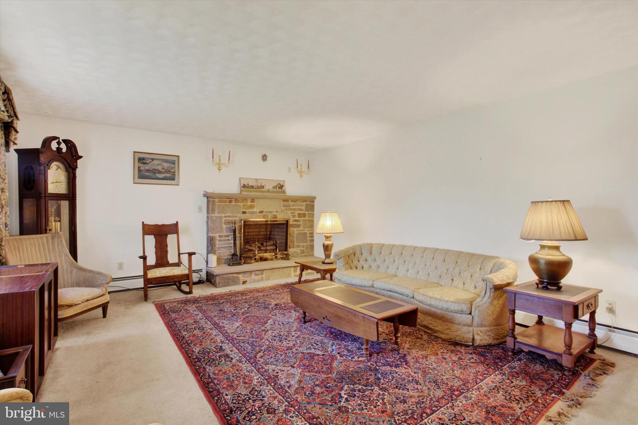 930 Hoffman Road Gettysburg, PA 17325 - Photo 4 of 36 a living room with furniture and a fireplace