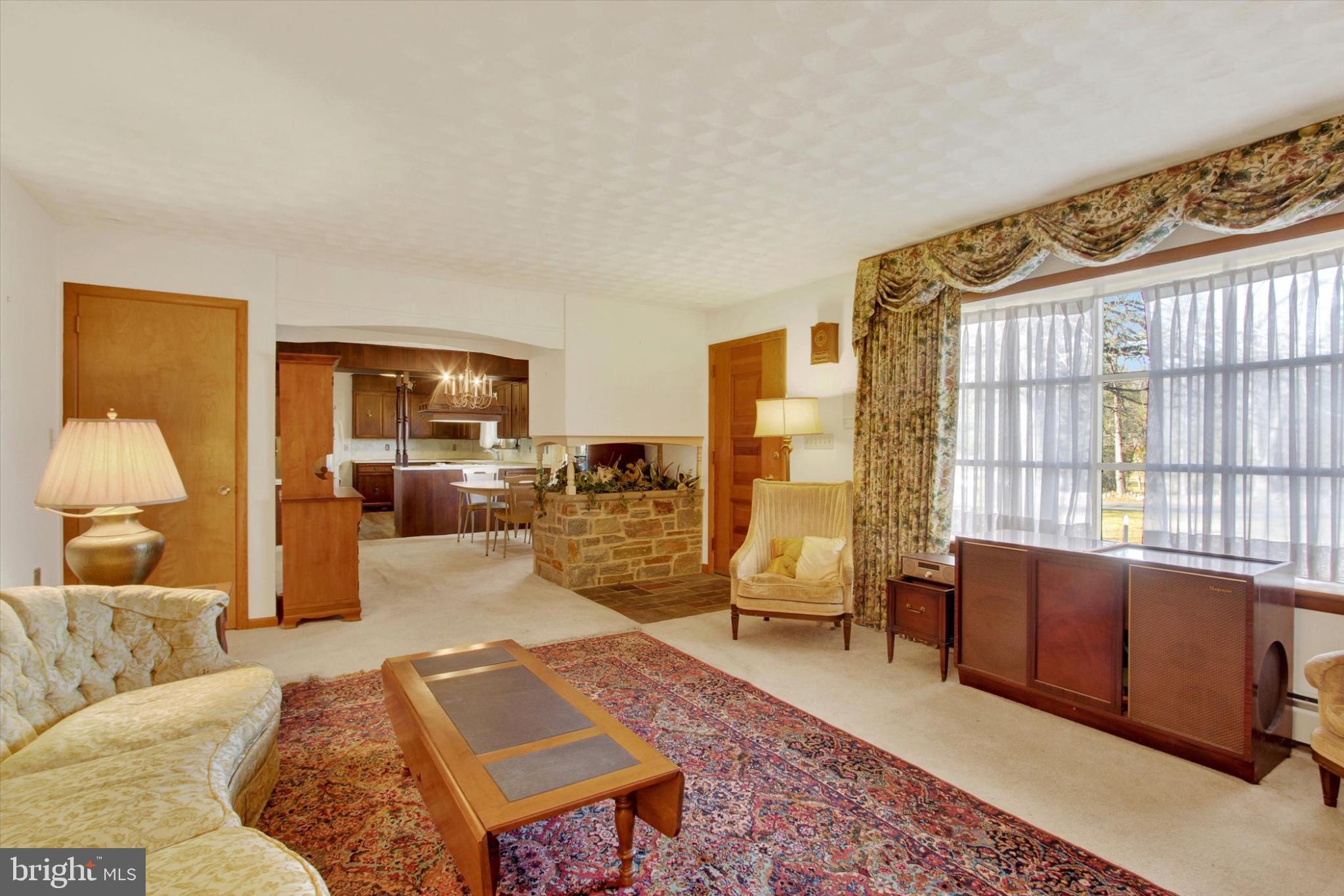 930 Hoffman Road Gettysburg, PA 17325 - Photo 6 of 36 a living room with furniture and a window