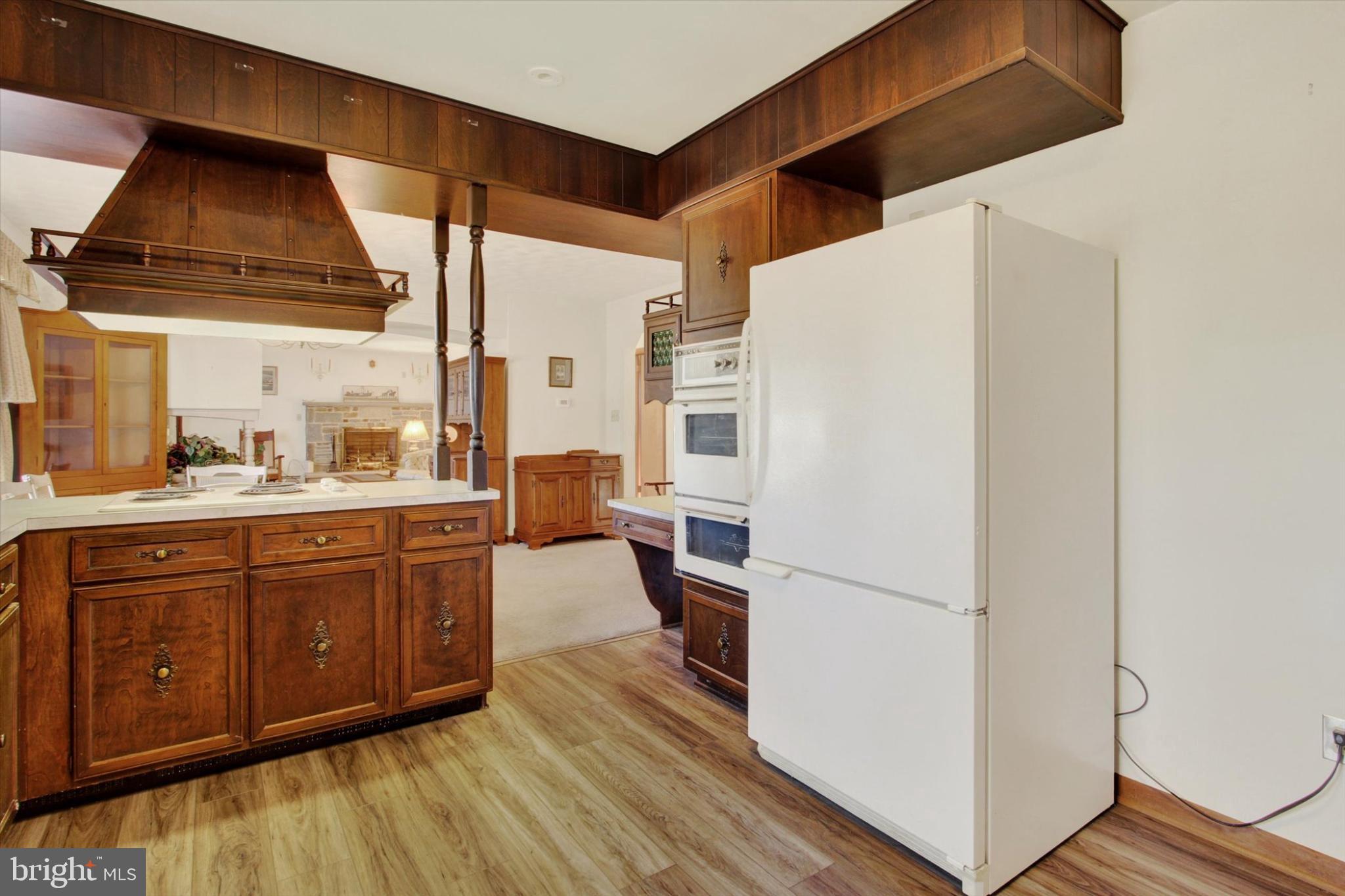 930 Hoffman Road Gettysburg, PA 17325 - Photo 10 of 36 a kitchen with stainless steel appliances a refrigerator and a stove