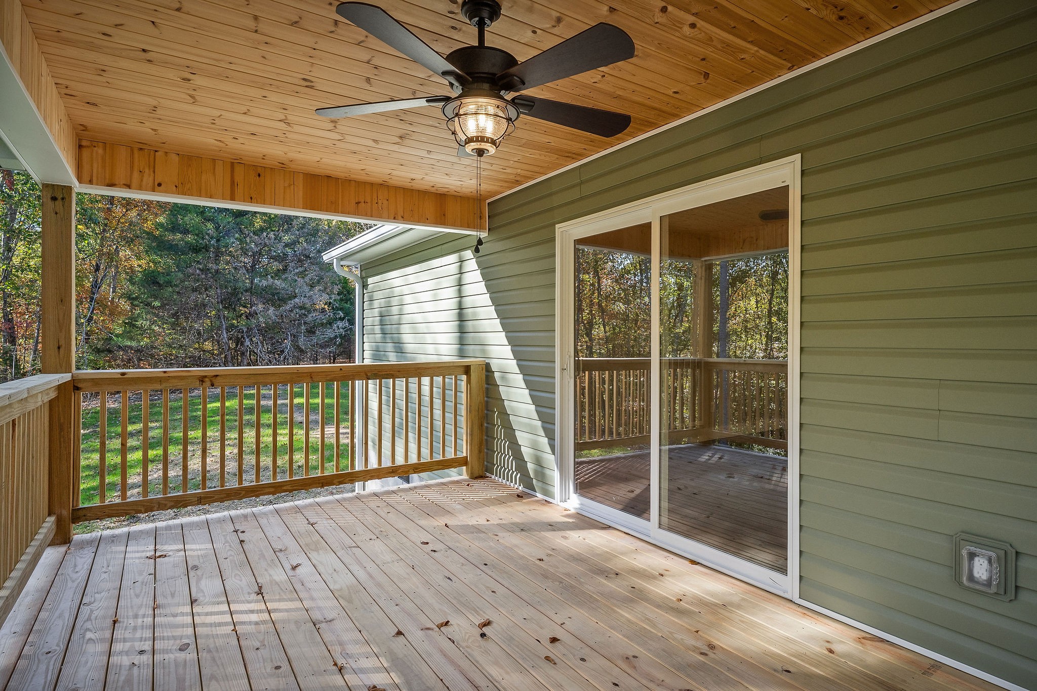 1053 Benton Tidwell Road Hilham, TN 38568 - Photo 24 of 27 a view of a porch with wooden floor