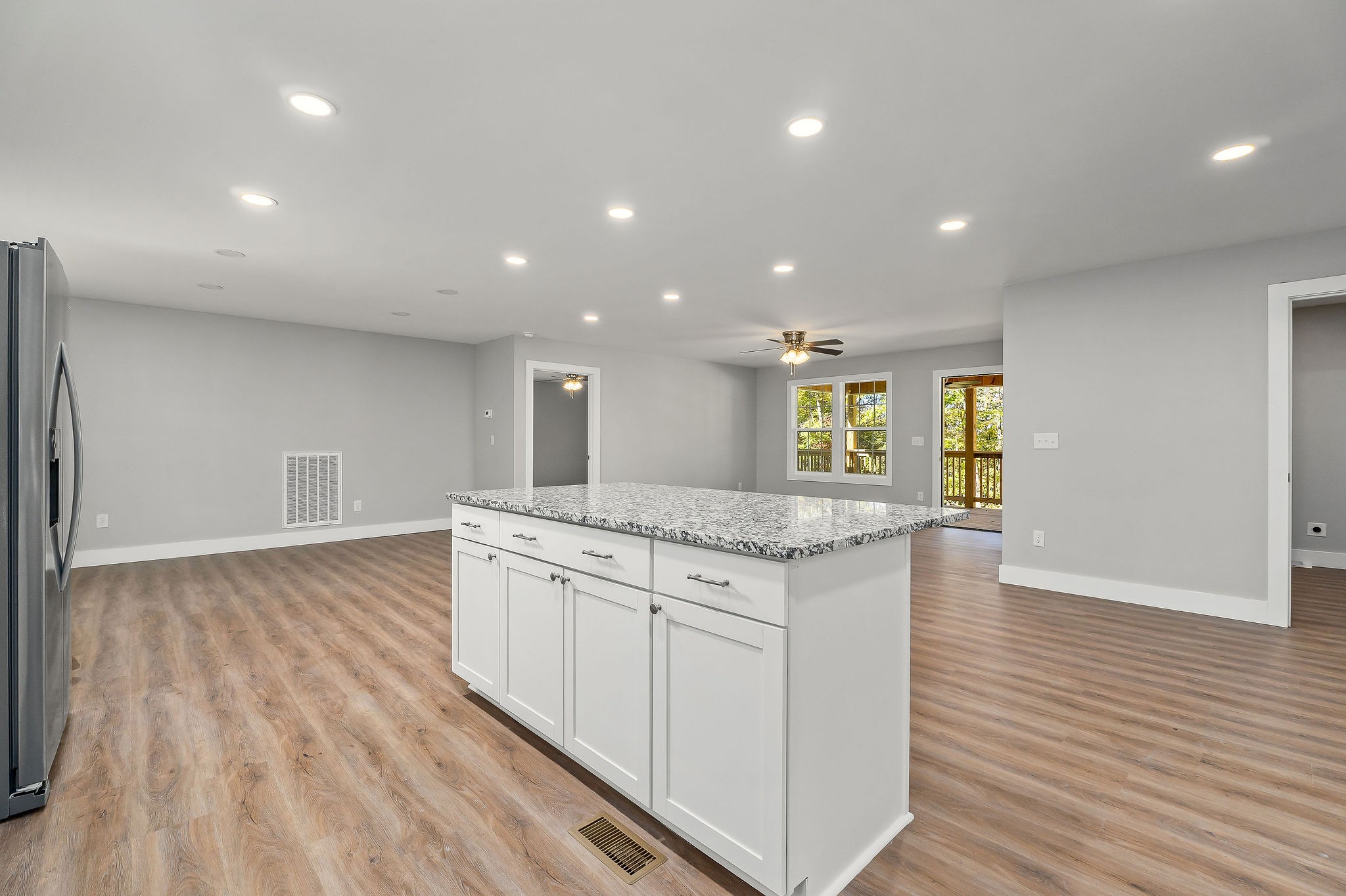 1053 Benton Tidwell Road Hilham, TN 38568 - Photo 8 of 27 a kitchen with granite countertop a stove and a sink