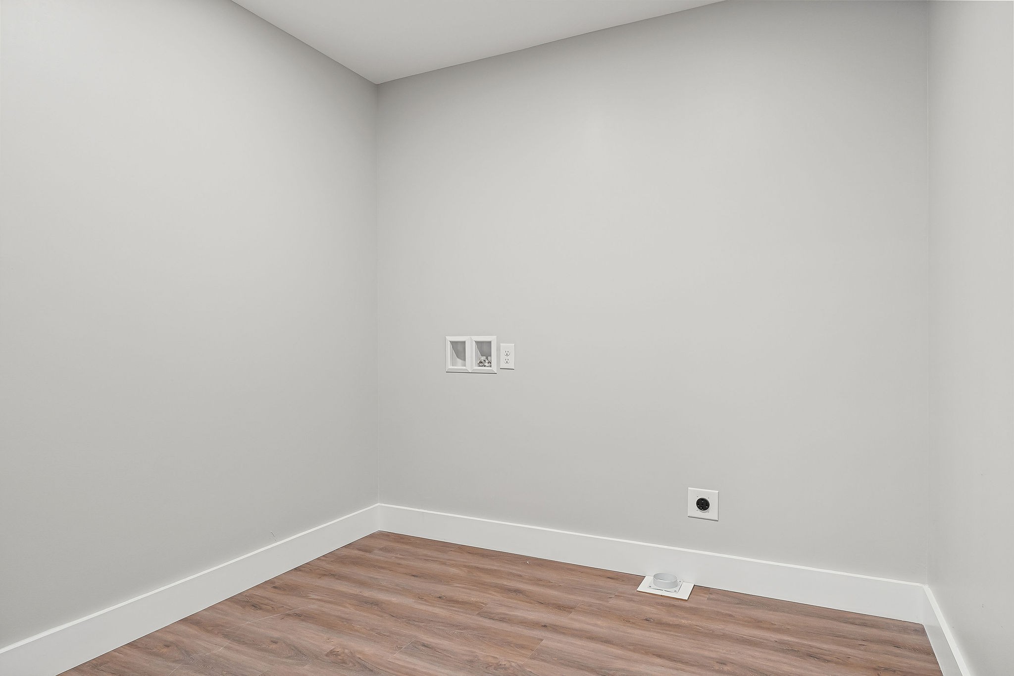 1053 Benton Tidwell Road Hilham, TN 38568 - Photo 10 of 27 a view of an empty room with wooden floor