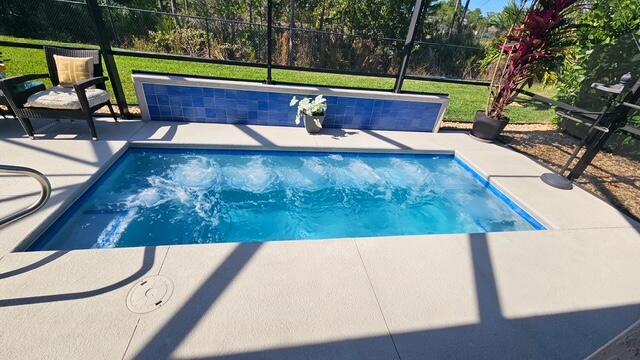 4480 Northwest Oakleaf Court Jensen Beach, FL 34957 - Photo 34 of 63 swimming pool view