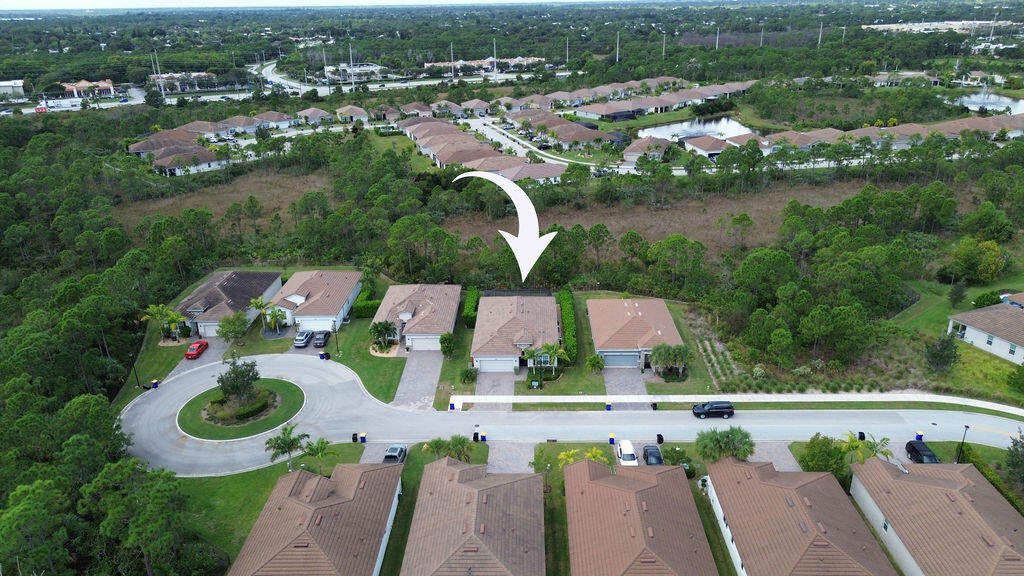 4480 Northwest Oakleaf Court Jensen Beach, FL 34957 - Photo 46 of 63 an aerial view of multiple house
