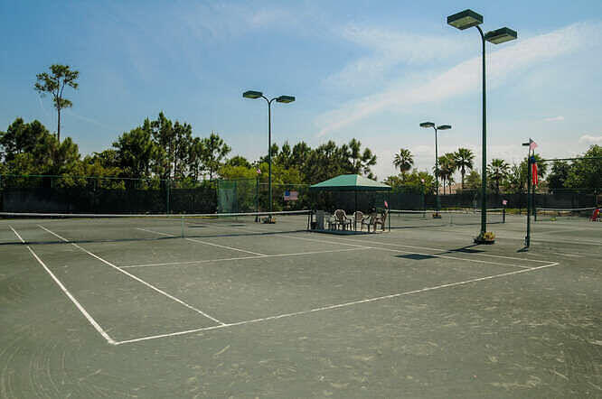 4480 Northwest Oakleaf Court Jensen Beach, FL 34957 - Photo 58 of 63 a view of a tennis court