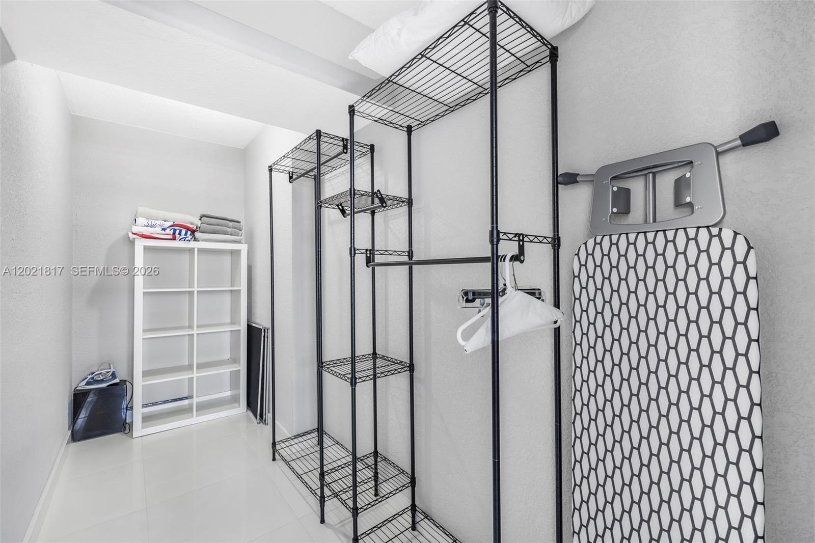 9511 Collins Avenue, Unit 1202 Surfside, FL 33154 - Photo 13 of 16 a bathroom with a shower