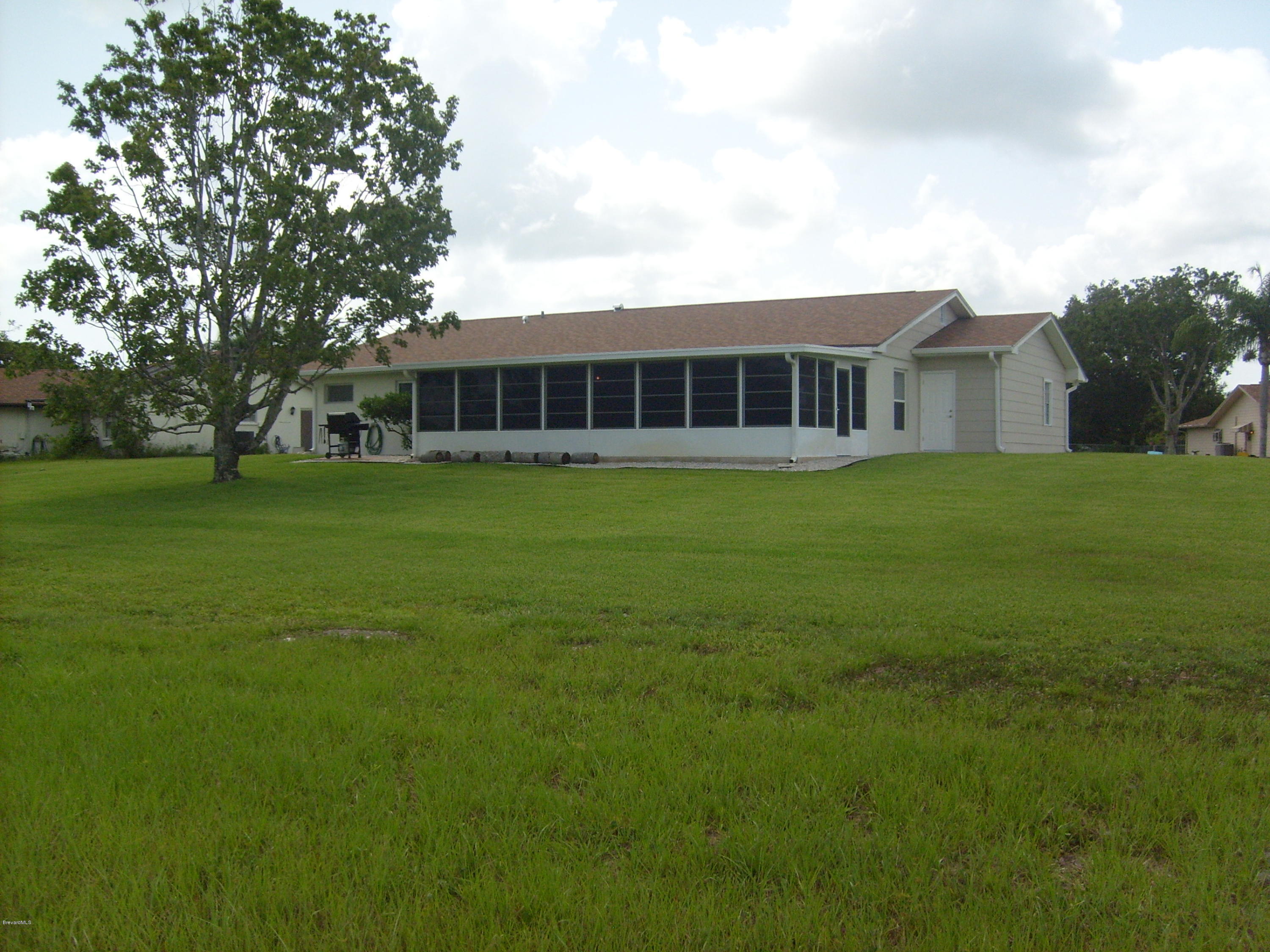 760 Montclair Road Northeast Palm Bay, FL 32905 - Photo 11 of 70 Rear