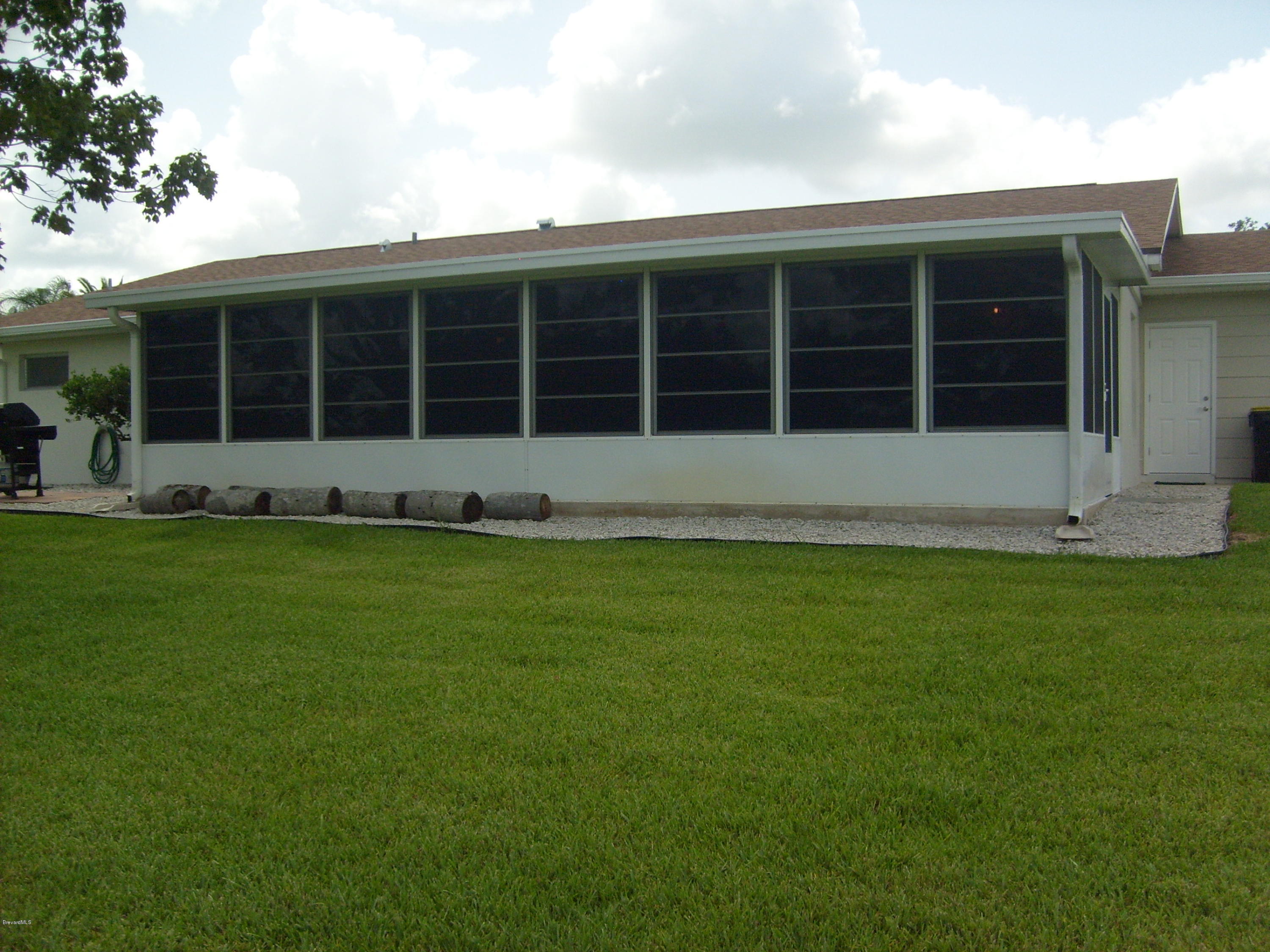 760 Montclair Road Northeast Palm Bay, FL 32905 - Photo 12 of 70 Rear enclosed patio close-up