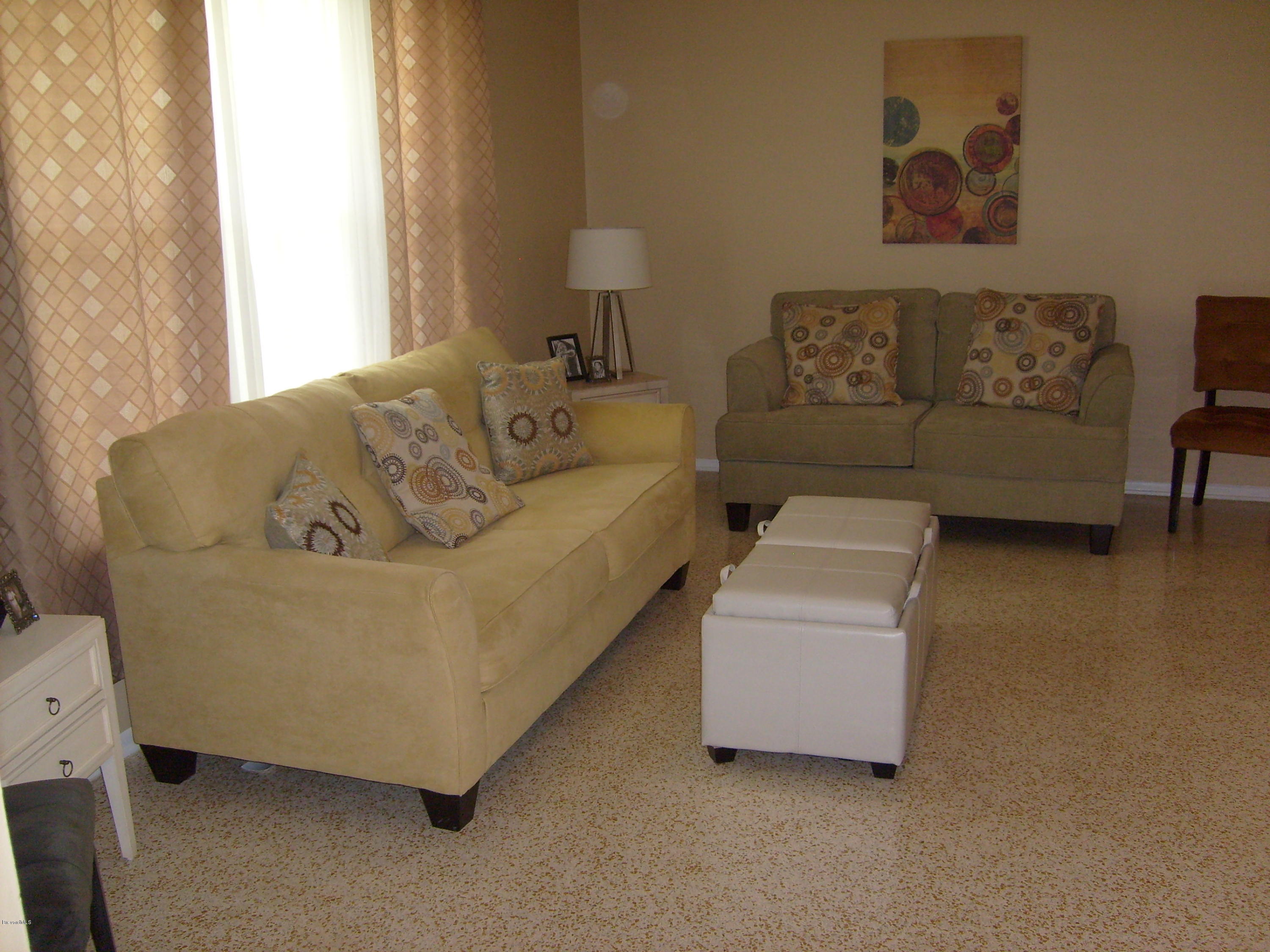 760 Montclair Road Northeast Palm Bay, FL 32905 - Photo 21 of 70 Formal living from foyer
