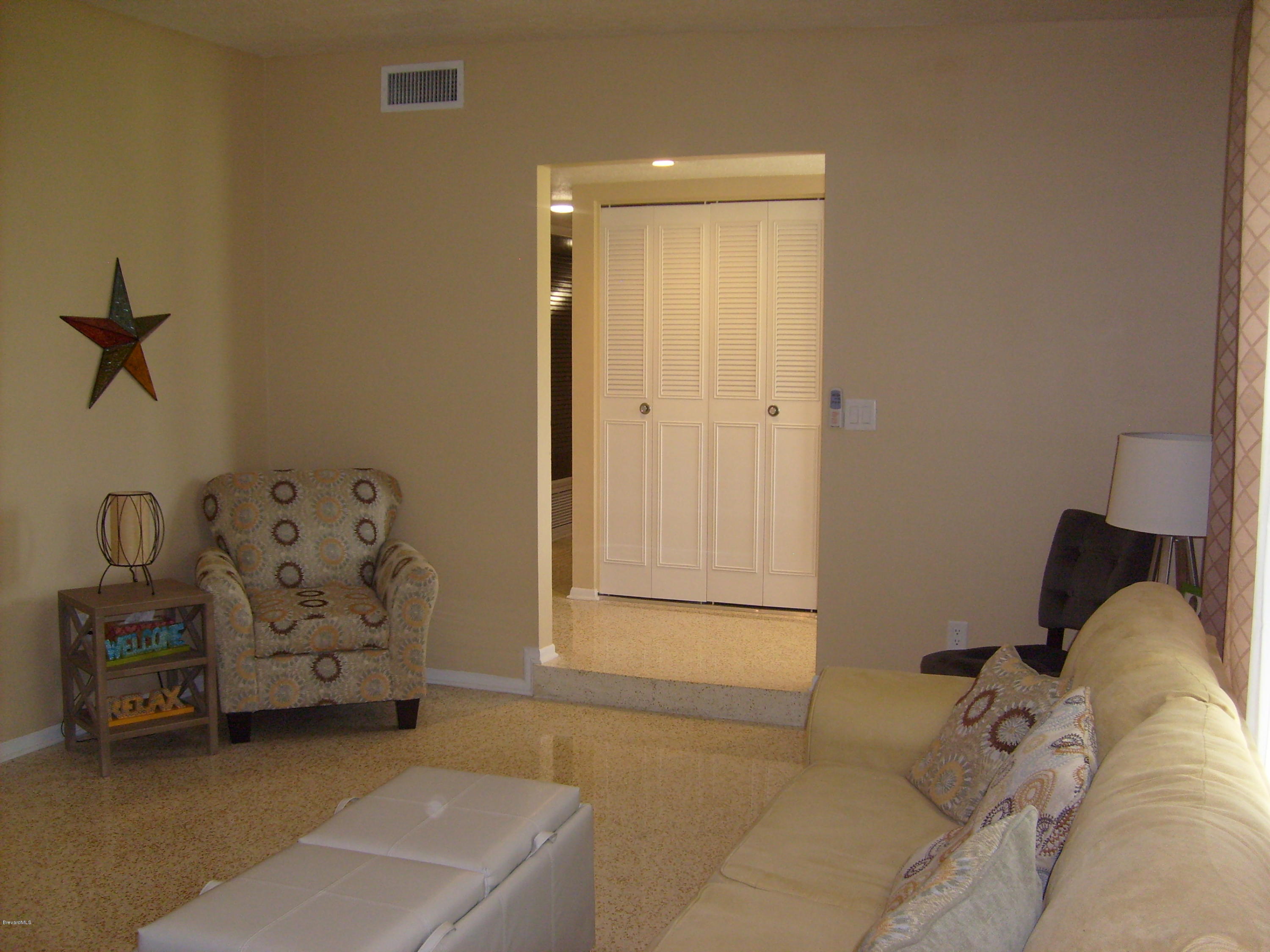 760 Montclair Road Northeast Palm Bay, FL 32905 - Photo 22 of 70 Formal living facing foyer