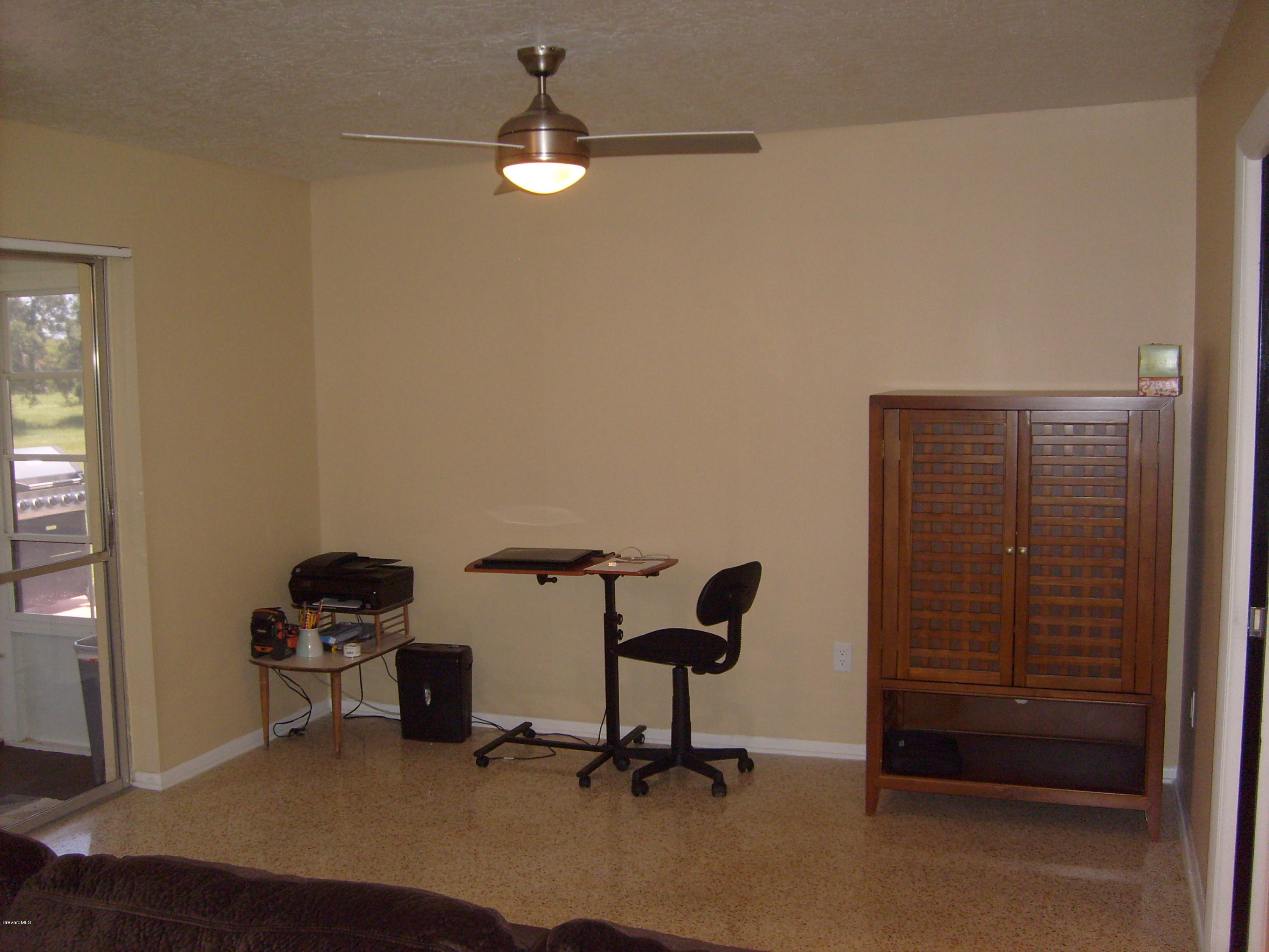 760 Montclair Road Northeast Palm Bay, FL 32905 - Photo 30 of 70 Family room/Breakfast nook