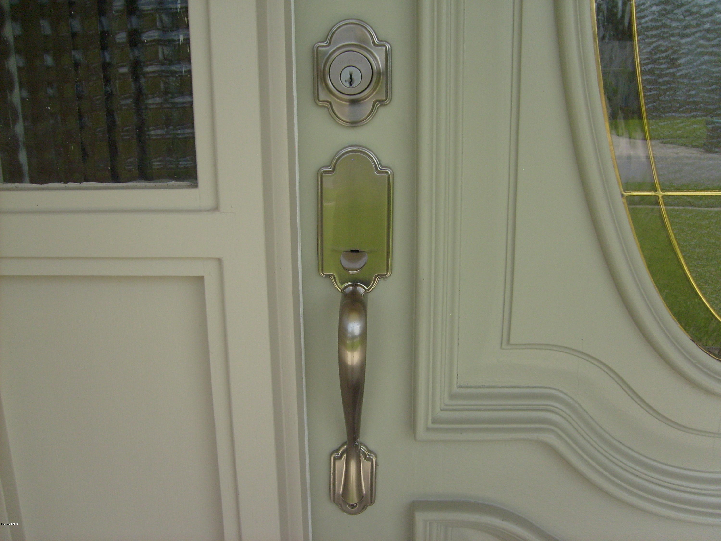 760 Montclair Road Northeast Palm Bay, FL 32905 - Photo 4 of 70 Front door hardware