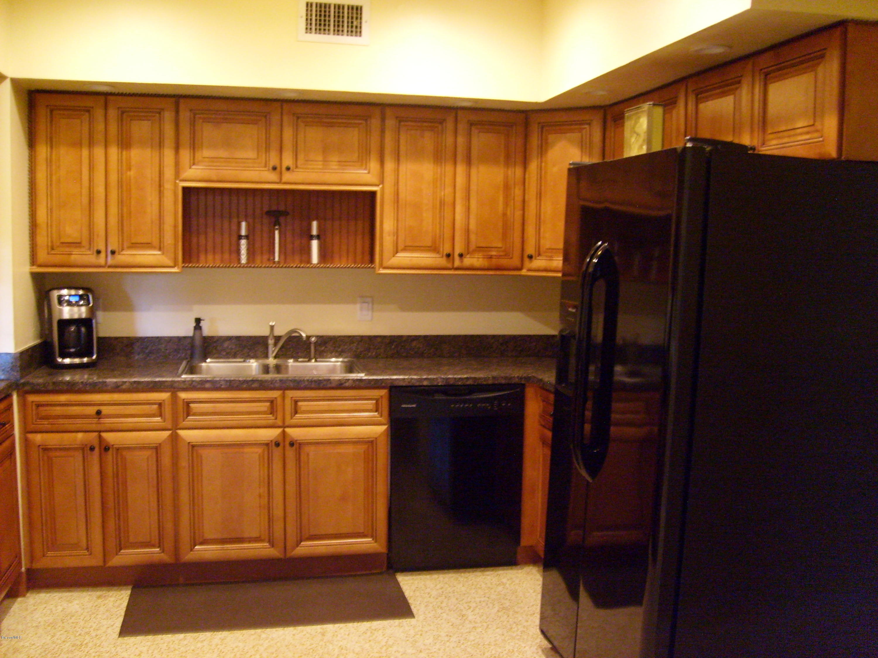 760 Montclair Road Northeast Palm Bay, FL 32905 - Photo 34 of 70 Kitchen mid-right