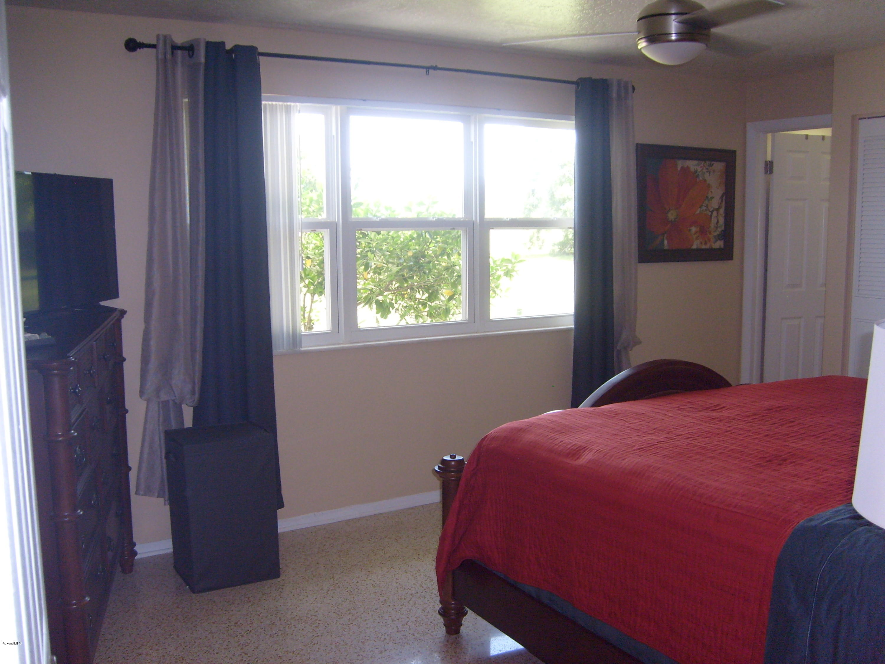 760 Montclair Road Northeast Palm Bay, FL 32905 - Photo 39 of 70 Master bedroom from hallway