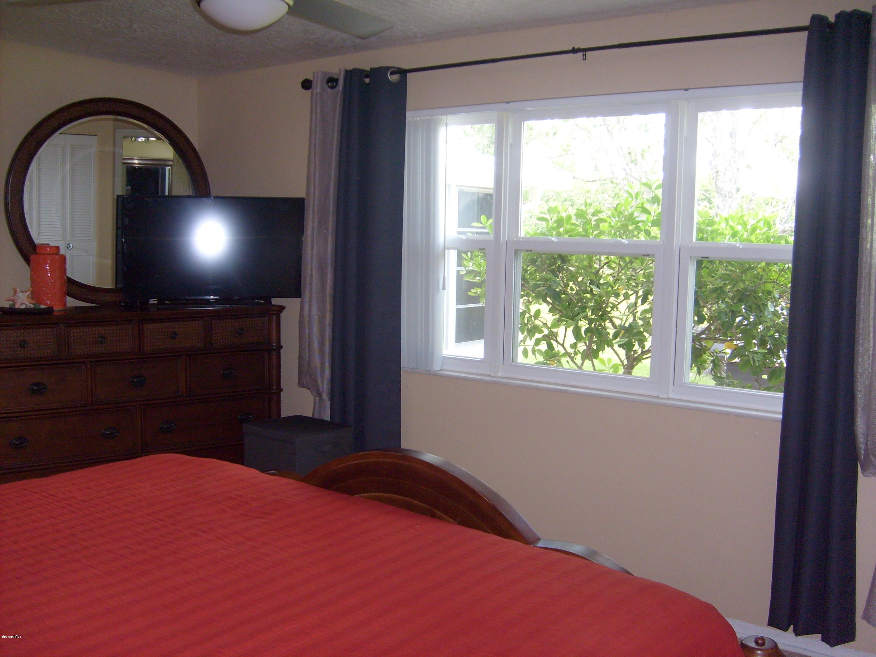 760 Montclair Road Northeast Palm Bay, FL 32905 - Photo 42 of 70 Master bedroom from closet corner