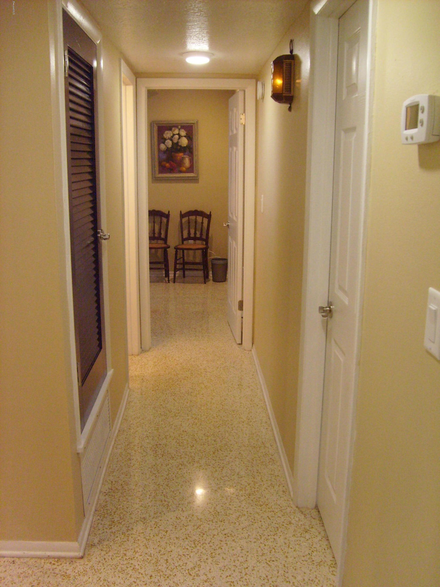 760 Montclair Road Northeast Palm Bay, FL 32905 - Photo 47 of 70 Hallway to bedrooms 2 & 3 from foyer