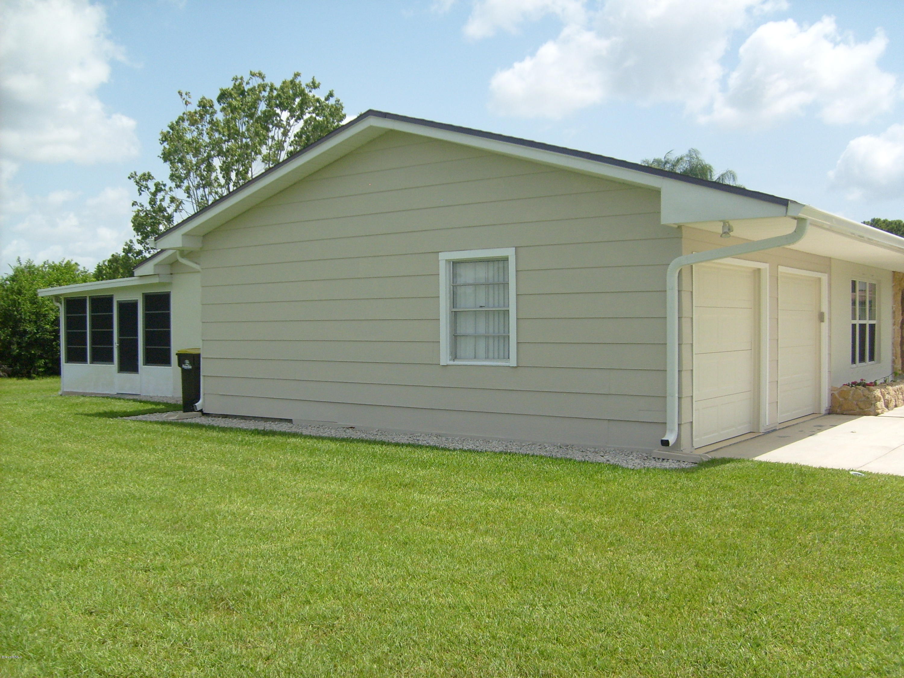 760 Montclair Road Northeast Palm Bay, FL 32905 - Photo 7 of 70 Left side