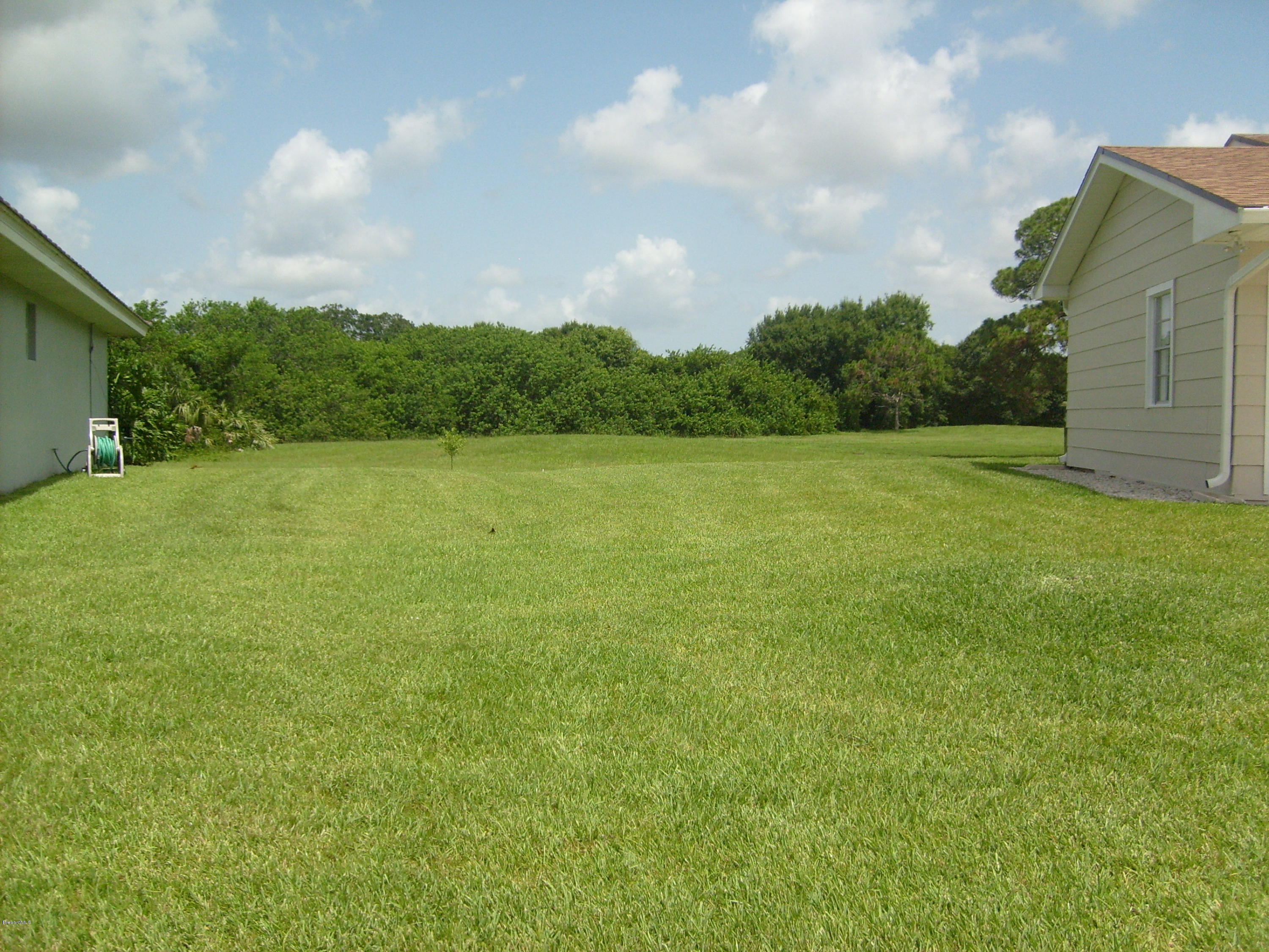760 Montclair Road Northeast Palm Bay, FL 32905 - Photo 9 of 70 Left side space between houses