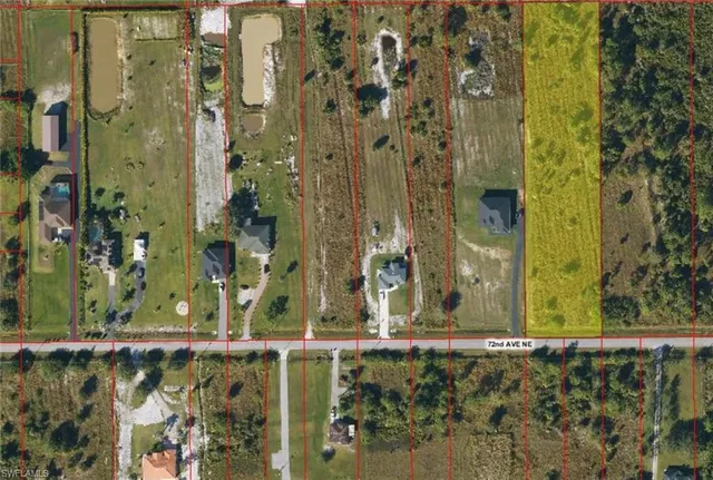 a bathroom with a granite countertop window and a shower