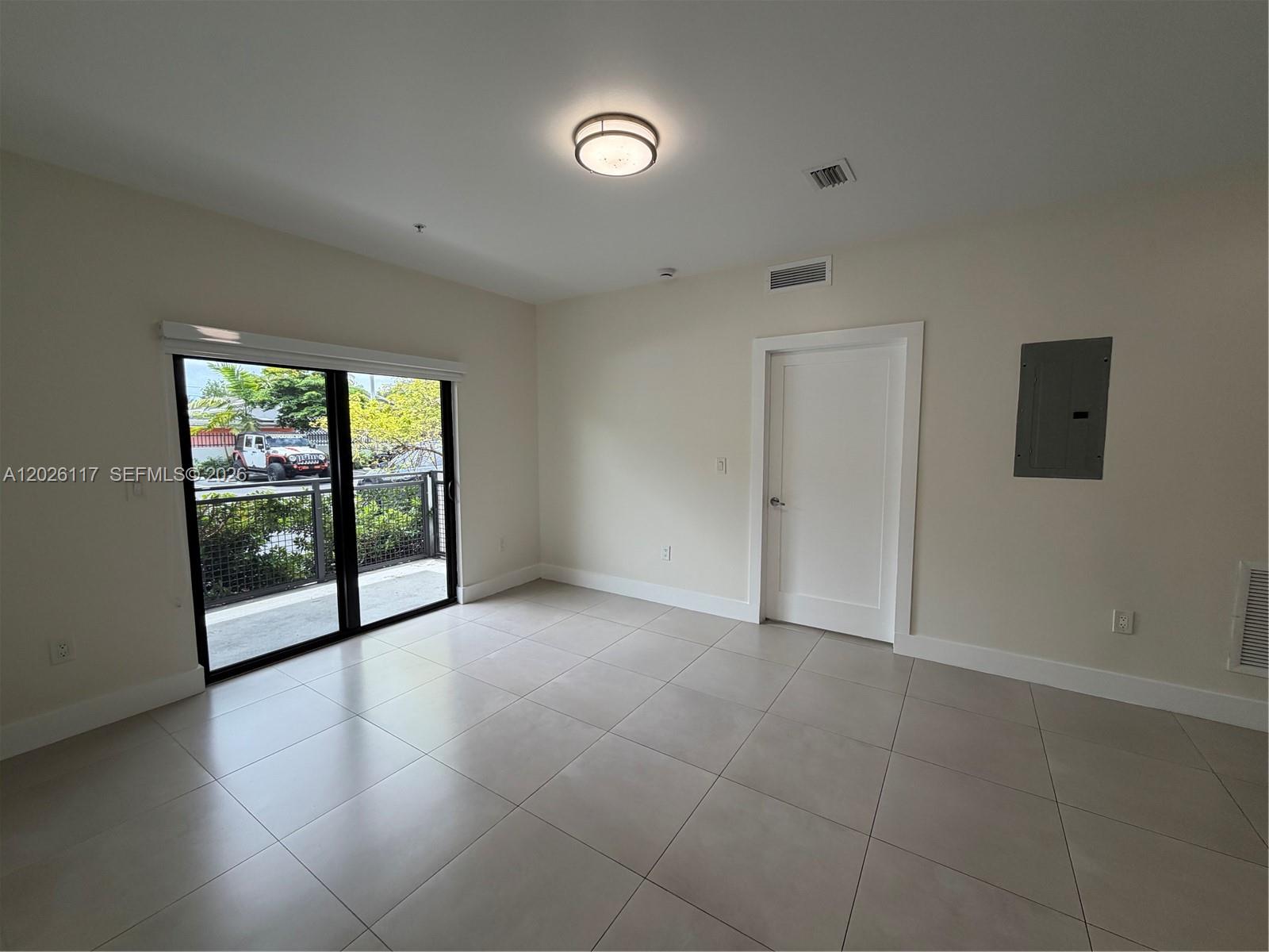 2425 Northwest 24th Avenue, Unit 103 Miami, FL 33142 - Photo 3 of 12