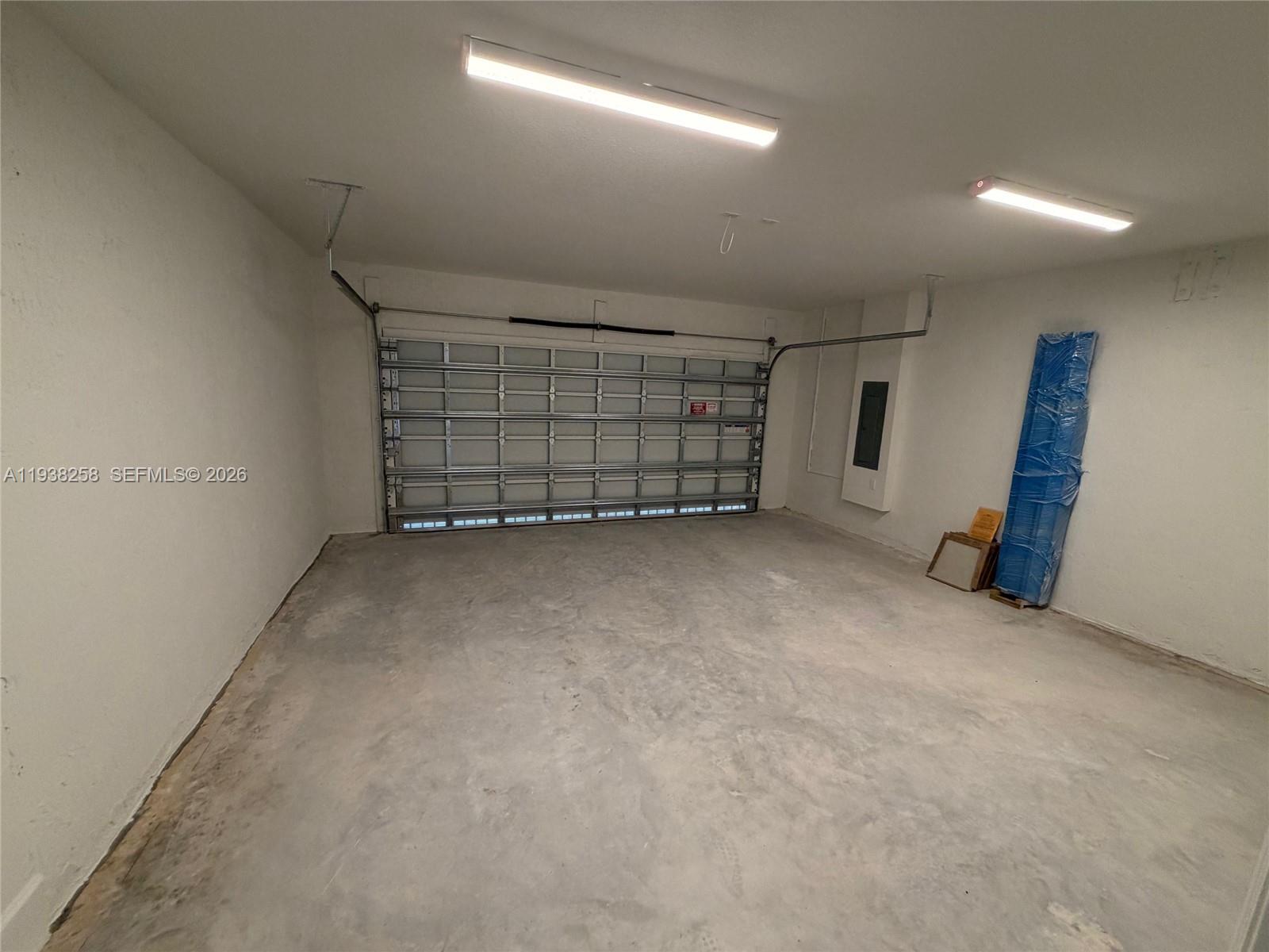 2256 Southeast 30th Street, Unit 2256 Homestead, FL 33035 - Photo 19 of 29 a view of an empty garage