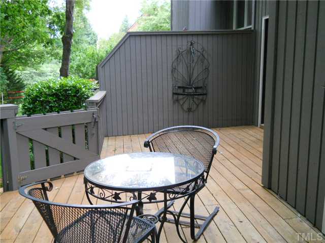 4347 Sunscape Lane Raleigh, NC 27613 - Photo 13 of 14 Another view of deck showing how large it is. You can enter the deck from the sun room or the living room. Perfect for a big summer party!