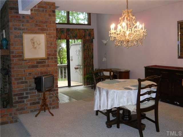 4347 Sunscape Lane Raleigh, NC 27613 - Photo 5 of 14 Dining room with beautiful chandelier, perfect for entertaining family and friends.