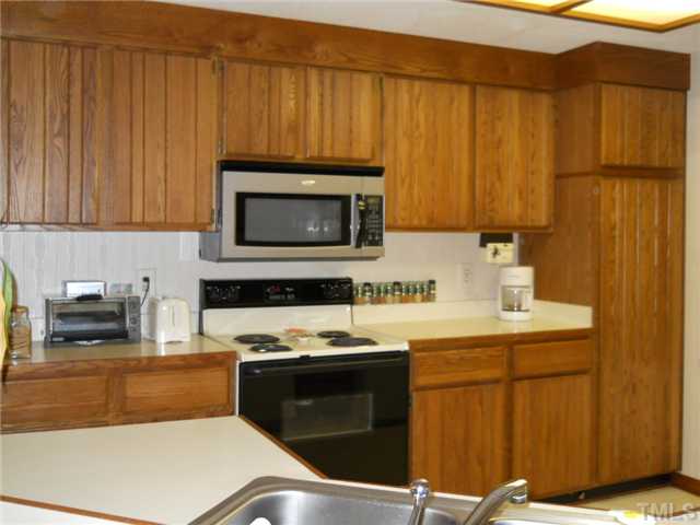 4347 Sunscape Lane Raleigh, NC 27613 - Photo 7 of 14 Recent new microwave, lots of cabinets and lots of room here for the family Chef!