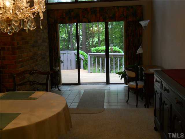 4347 Sunscape Lane Raleigh, NC 27613 - Photo 9 of 14 Lovely sunroom with tile floor; great traffic pattern for entertaining.