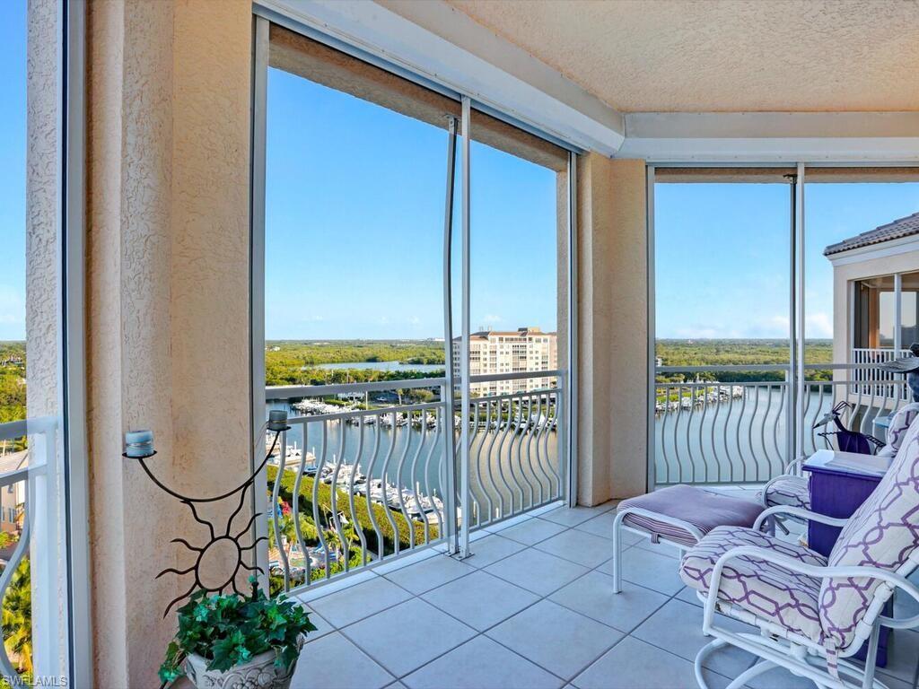 425 Dockside Drive, Unit PH1 Naples, FL 34110 - Photo 25 of 34 a view of balcony with couch