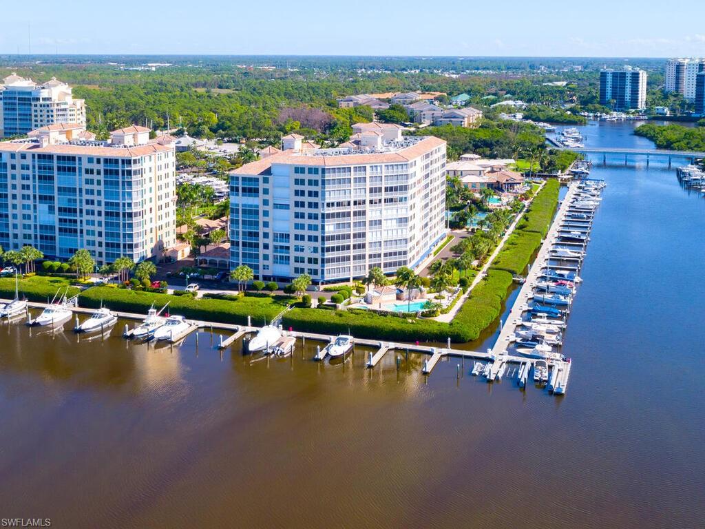 425 Dockside Drive, Unit PH1 Naples, FL 34110 - Photo 32 of 34 a view of a city with lawn chairs