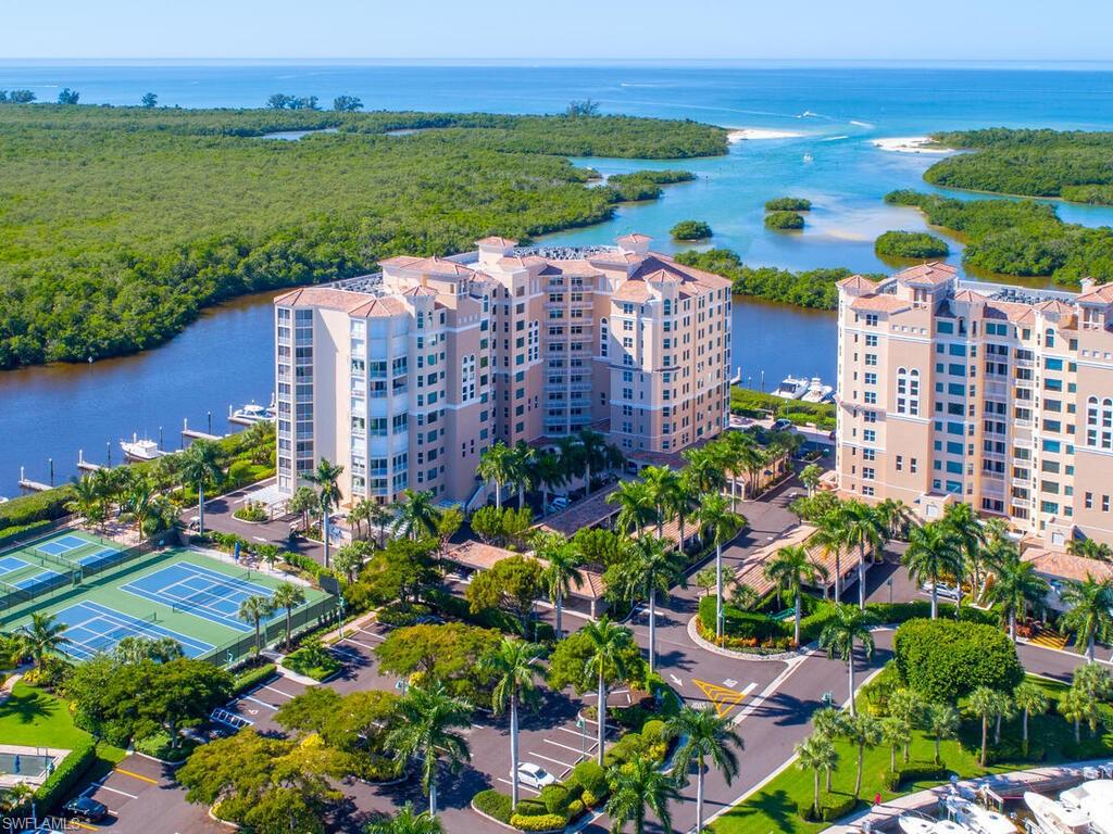425 Dockside Drive, Unit PH1 Naples, FL 34110 - Photo 33 of 34 a view of a city and an ocean