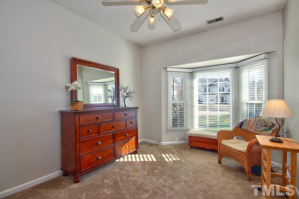 12225 Jarden Court Raleigh, NC 27613 - Photo 14 of 20 a living room with furniture and a large window