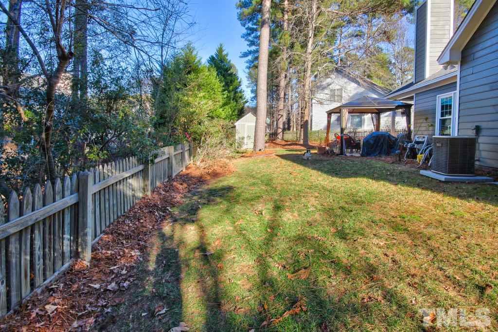 12225 Jarden Court Raleigh, NC 27613 - Photo 18 of 20 a view of a yard in front of house