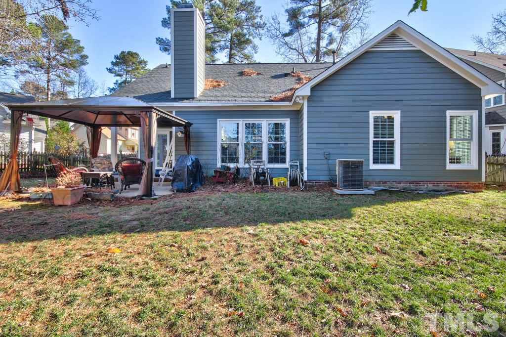 12225 Jarden Court Raleigh, NC 27613 - Photo 20 of 20 a view of a house with a patio