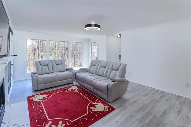 a living room with furniture and a couch