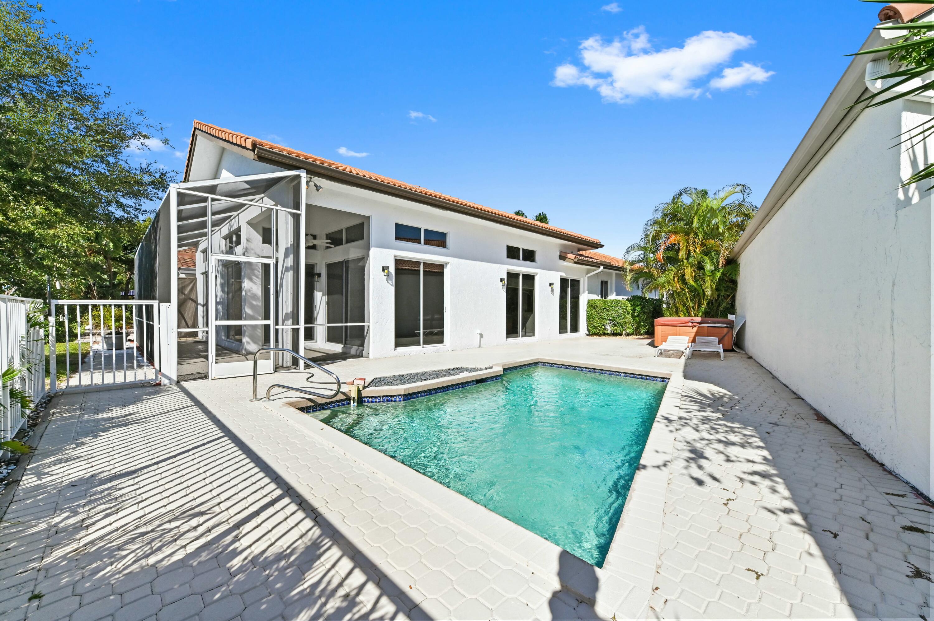 17272 Hampton Boulevard Boca Raton, FL 33496 - Photo 13 of 33 a view of a house with backyard and sitting area