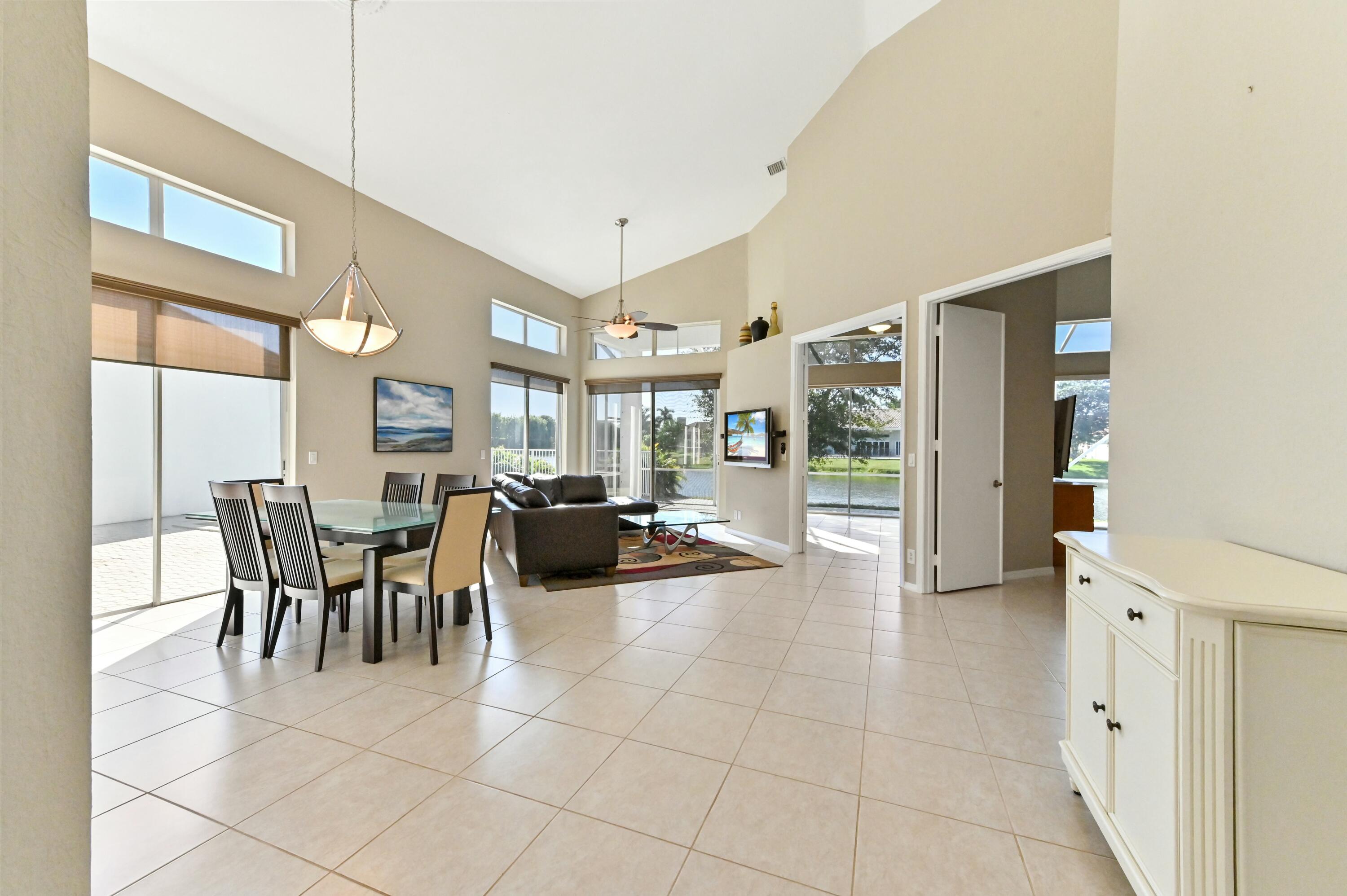 17272 Hampton Boulevard Boca Raton, FL 33496 - Photo 4 of 33 a view of a dining room with furniture